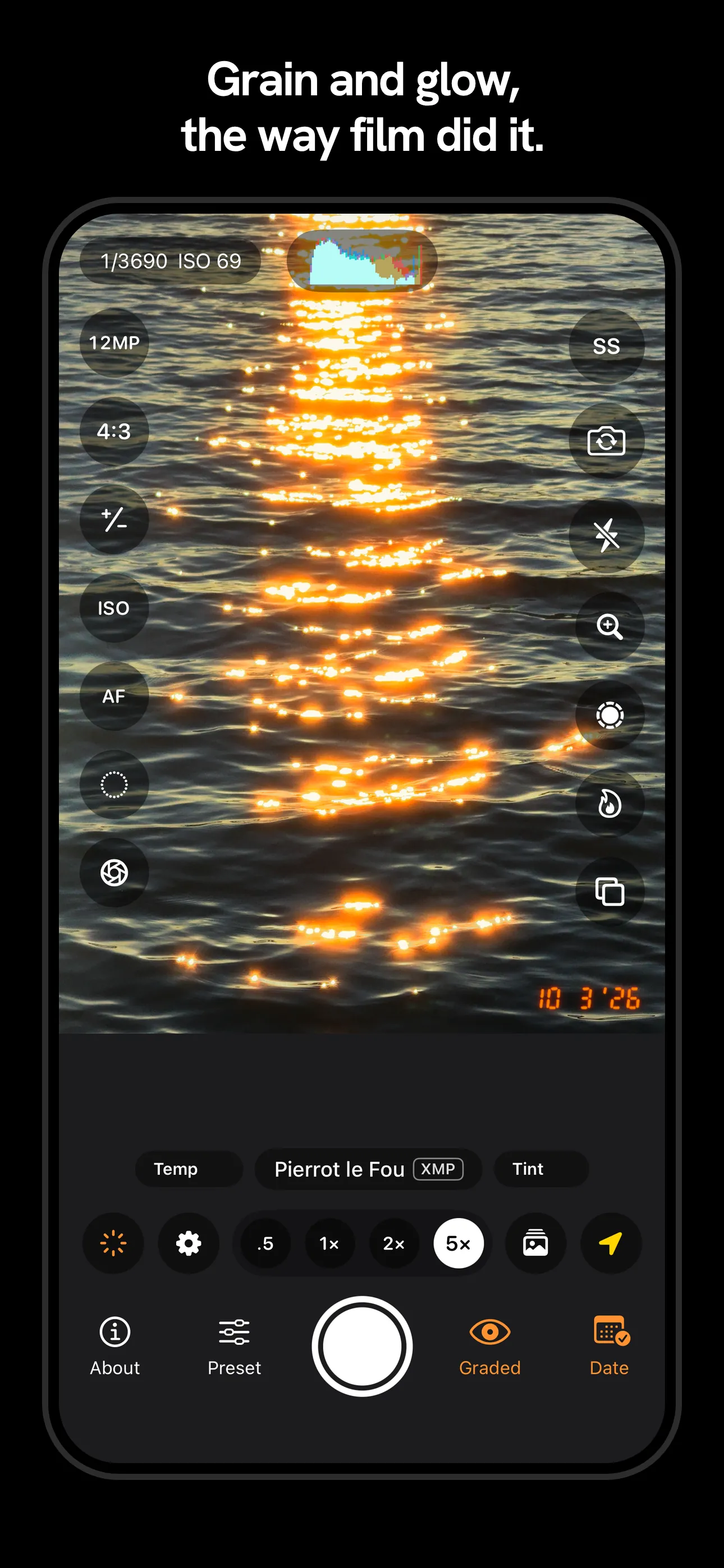 Low sun on rippling water through the Pierrot le Fou preset, each glint blooming orange with halation over fine grain, with the shutter speed, ISO and histogram across the top.